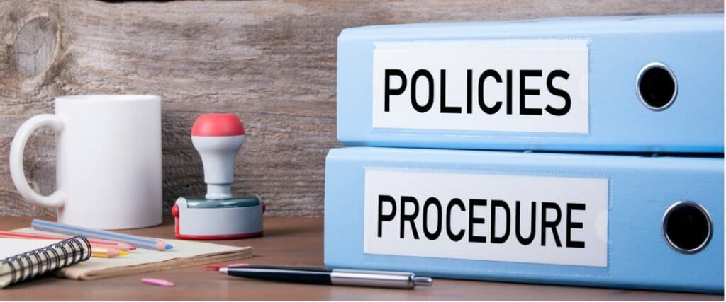 policies-and-procedure-two-binders-on-desk-picture-id621493052-1024x427.jpg