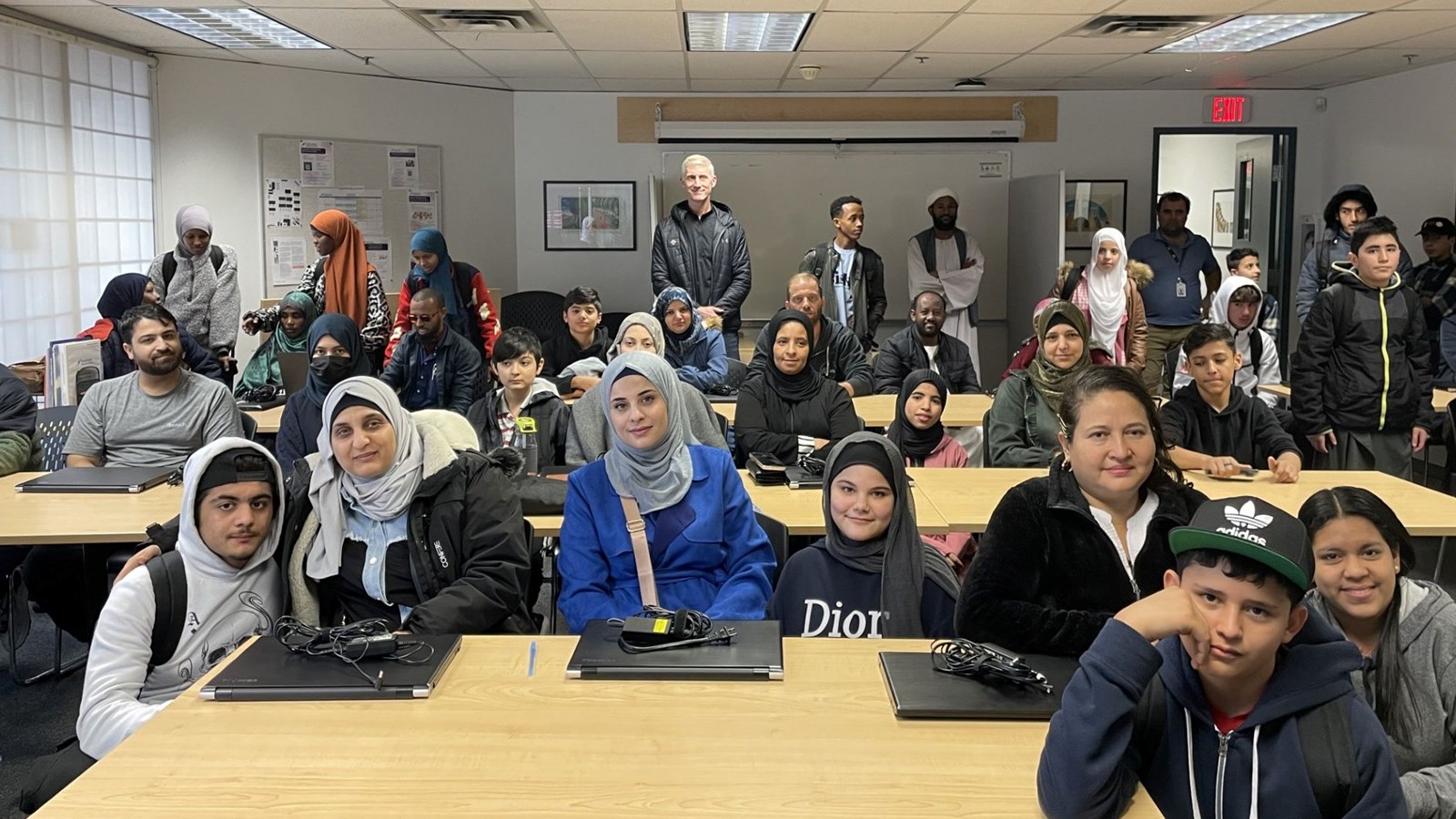 Surrey Fire Fighters Charitable Society donates 190 laptops for newcomer students